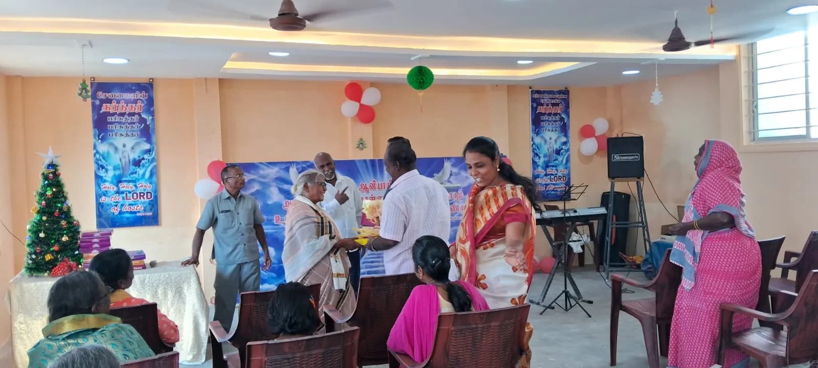 Adults taking part in an organisation-supplied community gathering in Puducherry