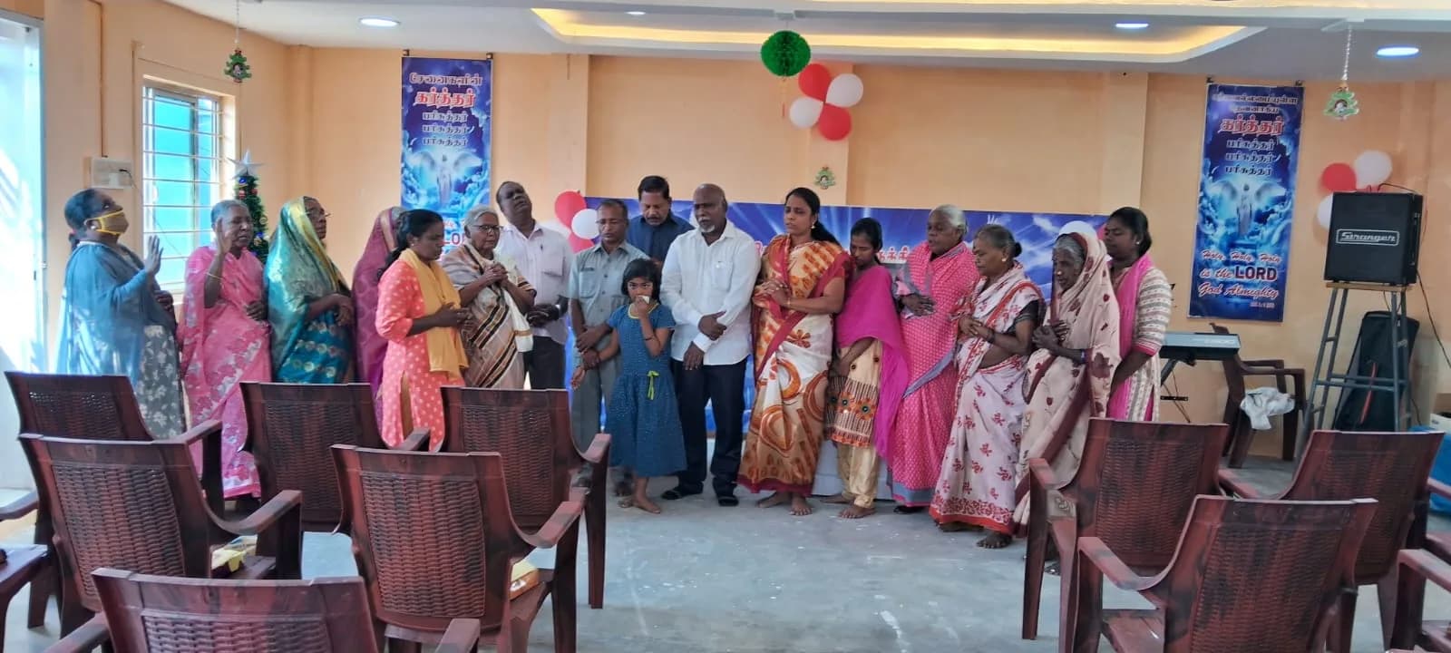 Adults participating in a community support gathering supplied by the organisation